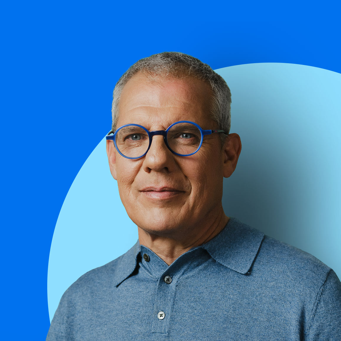 Man with a blue background